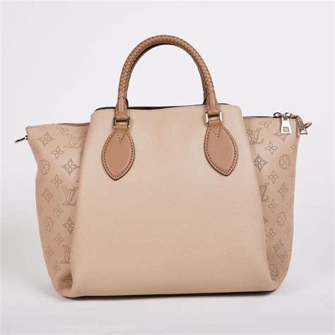 borsa haumea louis vuitton|LOUIS VUITTON HAUMEA Tote Bag in Galet Color Smooth and .